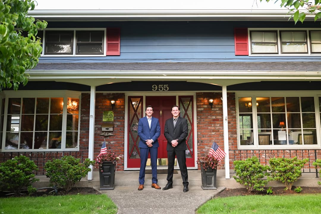 Jacob and Zac Schmerber, founders of Providential Home Care, outside a client's home in the Portland metro area